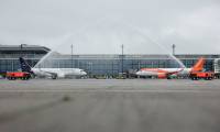 Berlin's much delayed new airport welcomes first flights